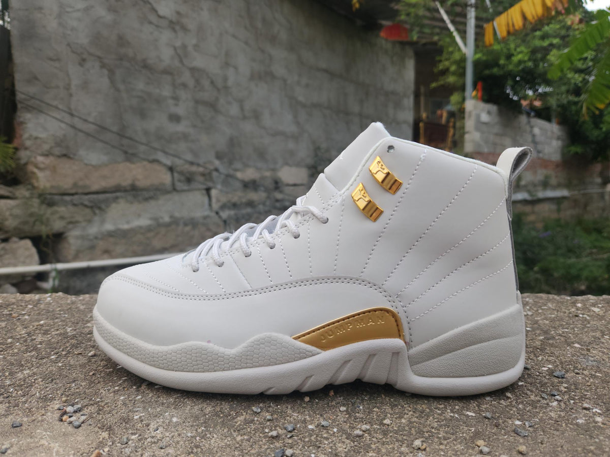 Air Jordan 12 Retro – Grey/Gold ("Taxi")